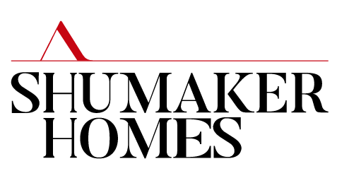 shumaker homes logo red and black