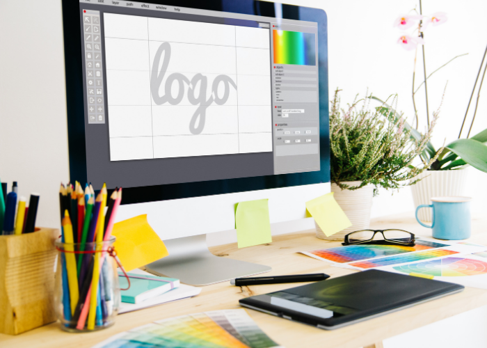graphic design desk working on a logo 