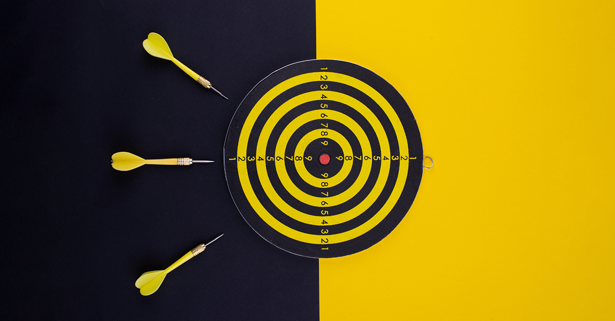 objective based marketing dartboard yellow and black