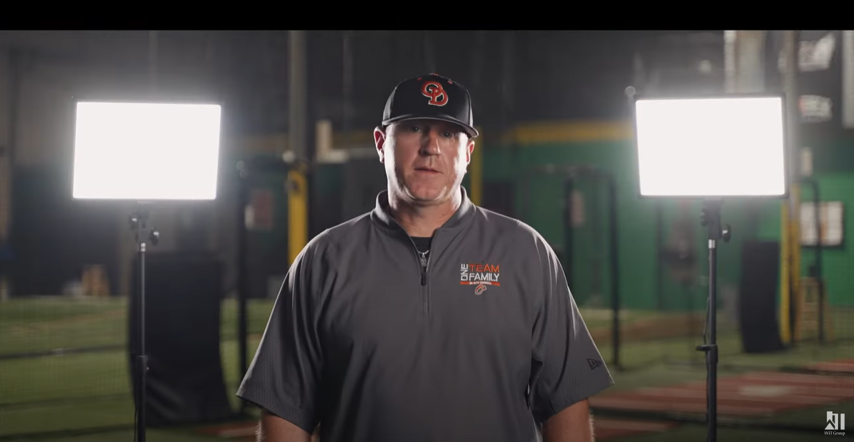 baseball coach on promotional video speaking