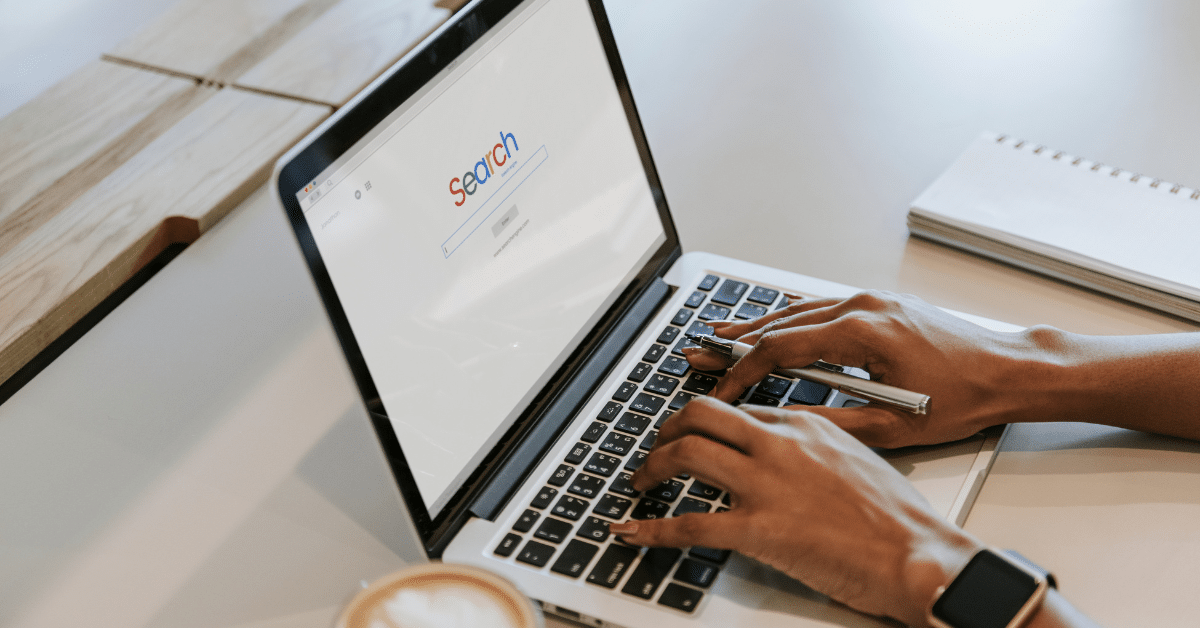 person looking through google search results